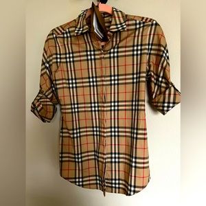 Women’s Burberry Vintage check shirt size 4. It’s brand new never worn.